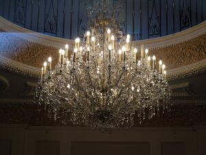 thợ thi công trần thạch cao chuyên nghiệp bình châu | Lavish crystal chandelier with intricate details in a luxurious interio