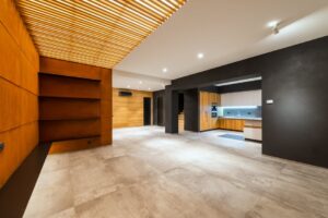 thợ thi công trần thạch cao showroom châu đức | Bright empty modern interior with wooden accents and minimal design, perfect