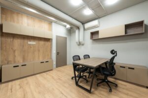 báo giá vách thạch cao tại vũng tàu | Stylish and minimalist office interior with modern furniture and clean design.