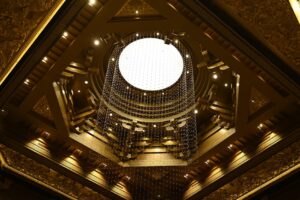 báo giá thi công trần thạch cao biệt thự long hải | A stunning view of a lavish golden chandelier hanging from an intricately