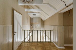 báo giá thi công trần thạch cao phước bửu | A beautifully designed interior showcasing wooden paneling and modern lighting in