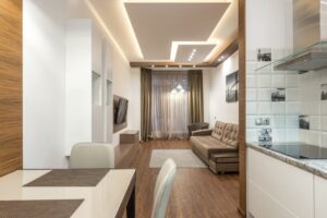 báo giá thi công trần thạch cao showroom ngãi giao | Elegant modern apartment interior with minimalist decor and cozy ambianc